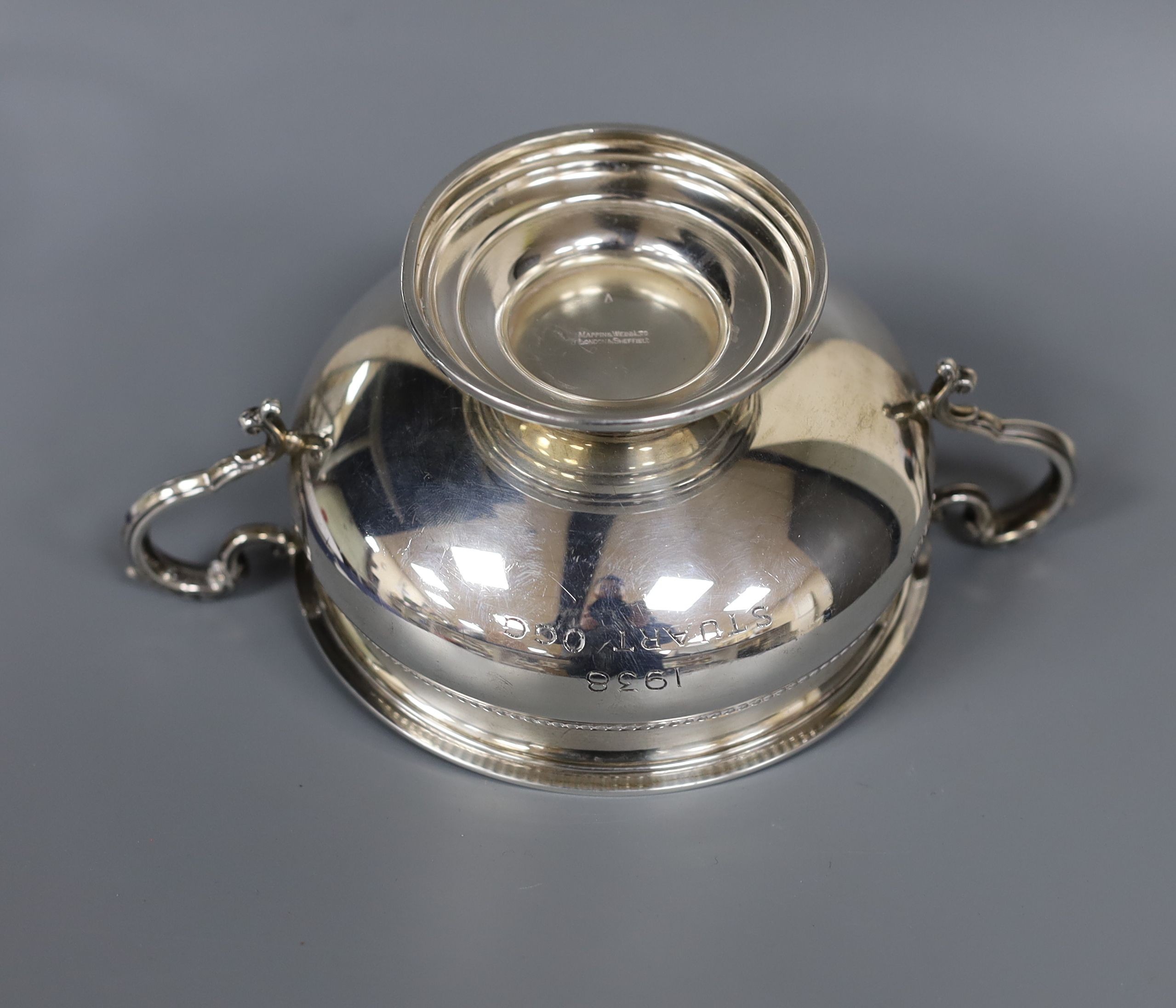 A George V silver small rose bowl, Birmingham, 1913, diameter 12.8cm and a later silver two handled bowl, gross 14.5oz.